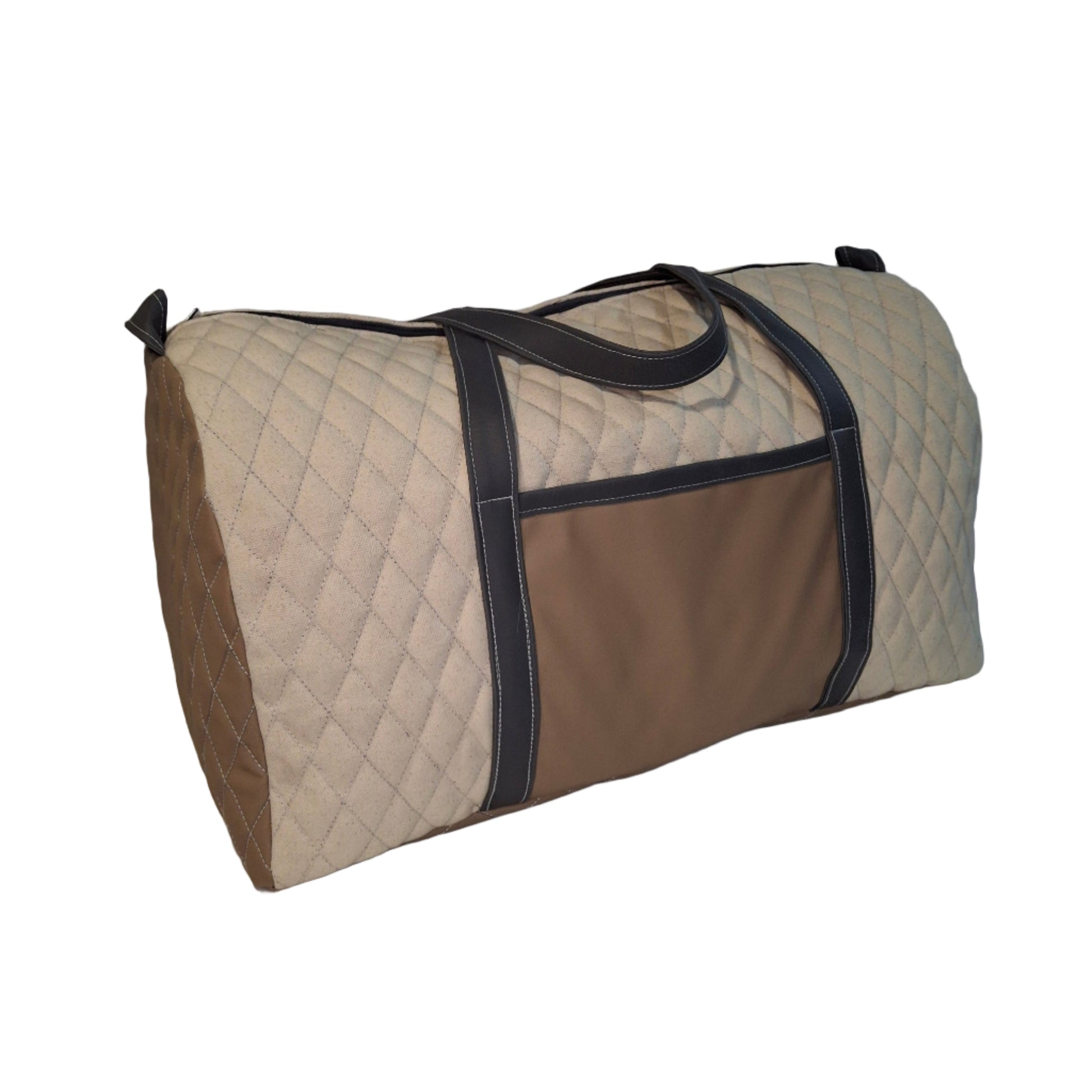 Quilted bag with a brown patch on a light gray background
