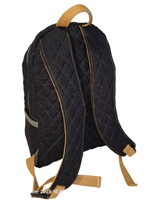 Black quilted backpack with gold accents on a white background