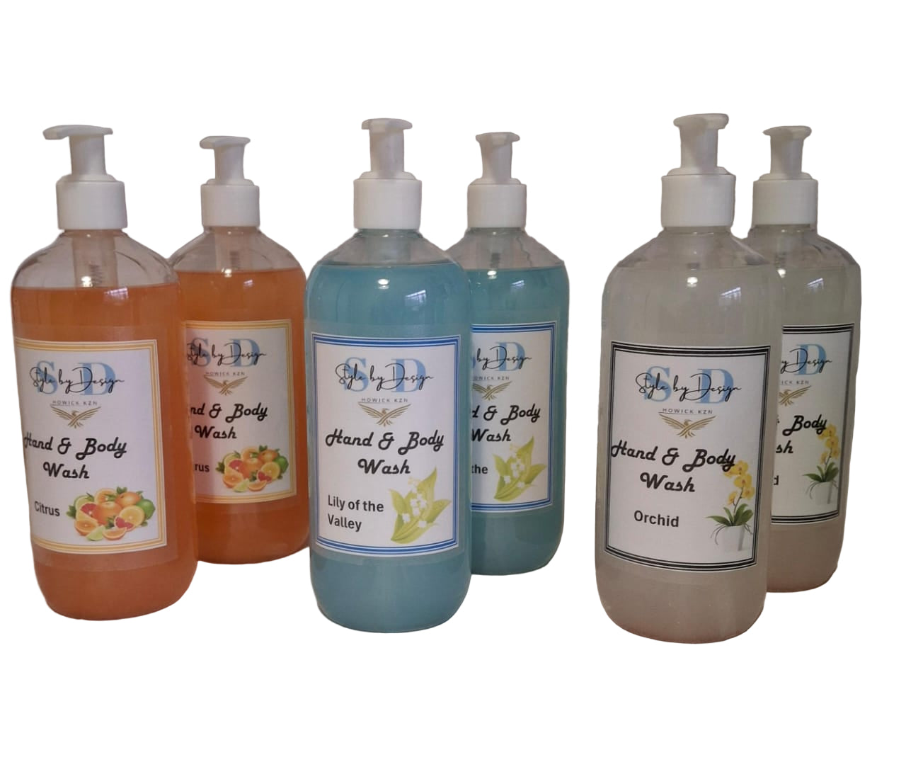 Set of hand and body wash bottles with various scents 